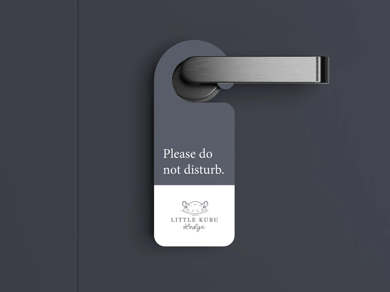 Little Kubu Lodge logo on a do not disturb door hanger sign