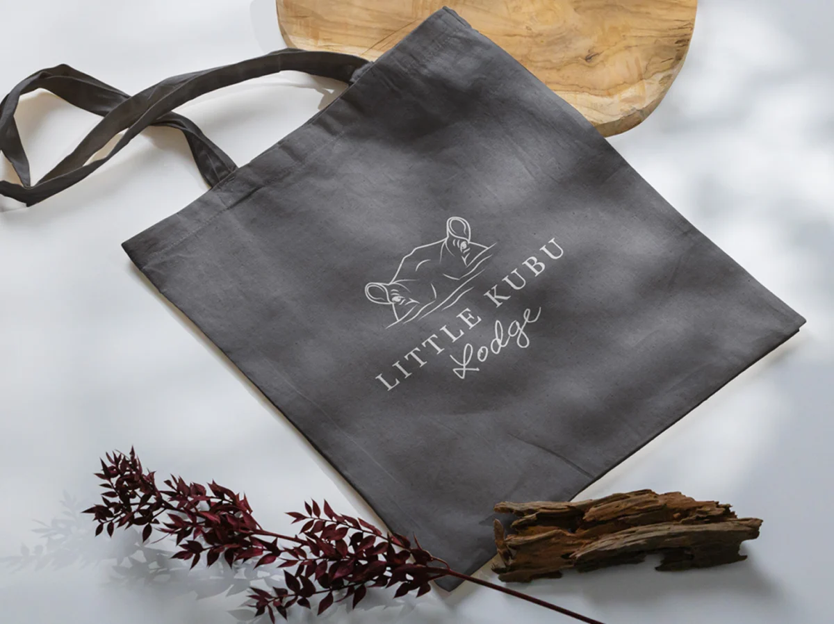 Little Kubu Lodge logo on a brown tote bag